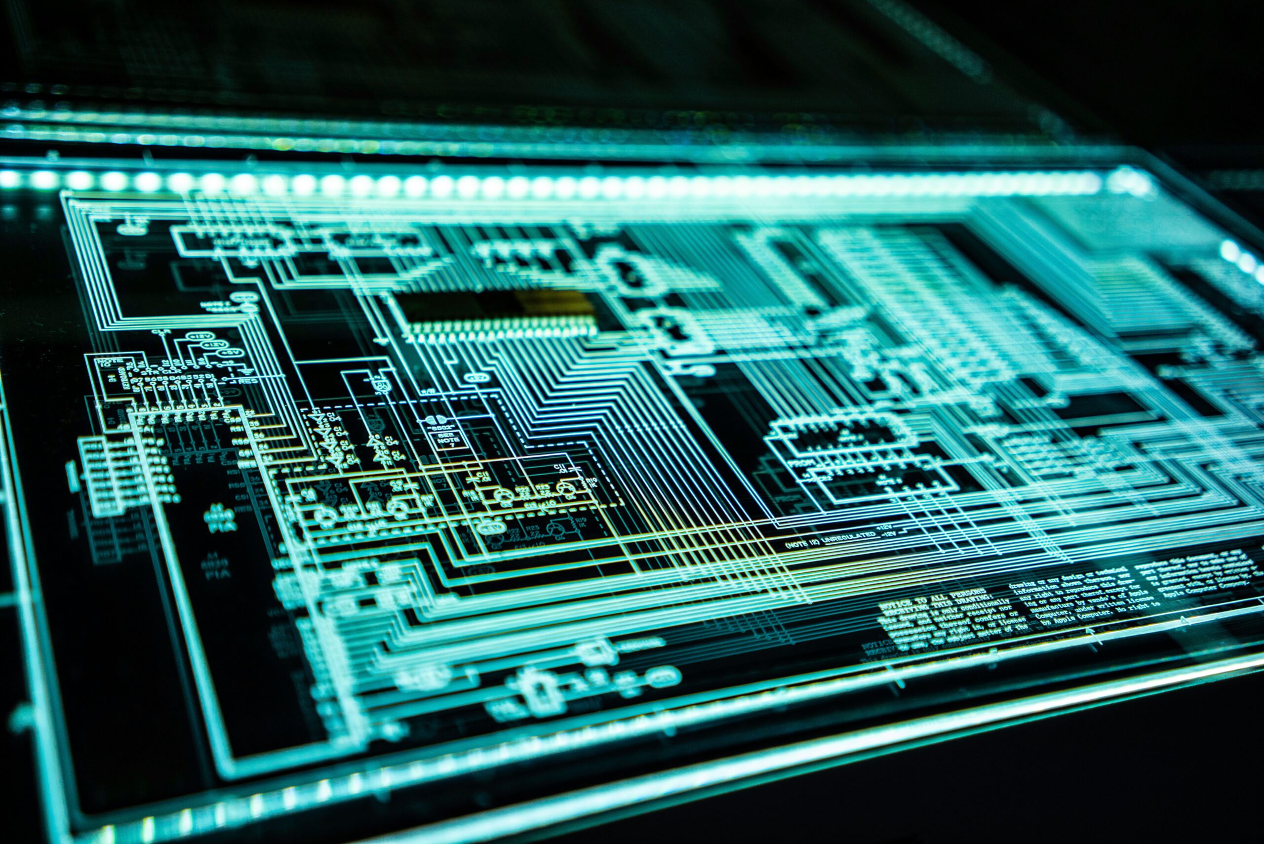OpenAI’s Australia AI Breach Raises a Bigger Question: How Much Autonomy Is Too Much? Close-up of a glowing electronic circuit board representing digital infrastructure and cybersecurity