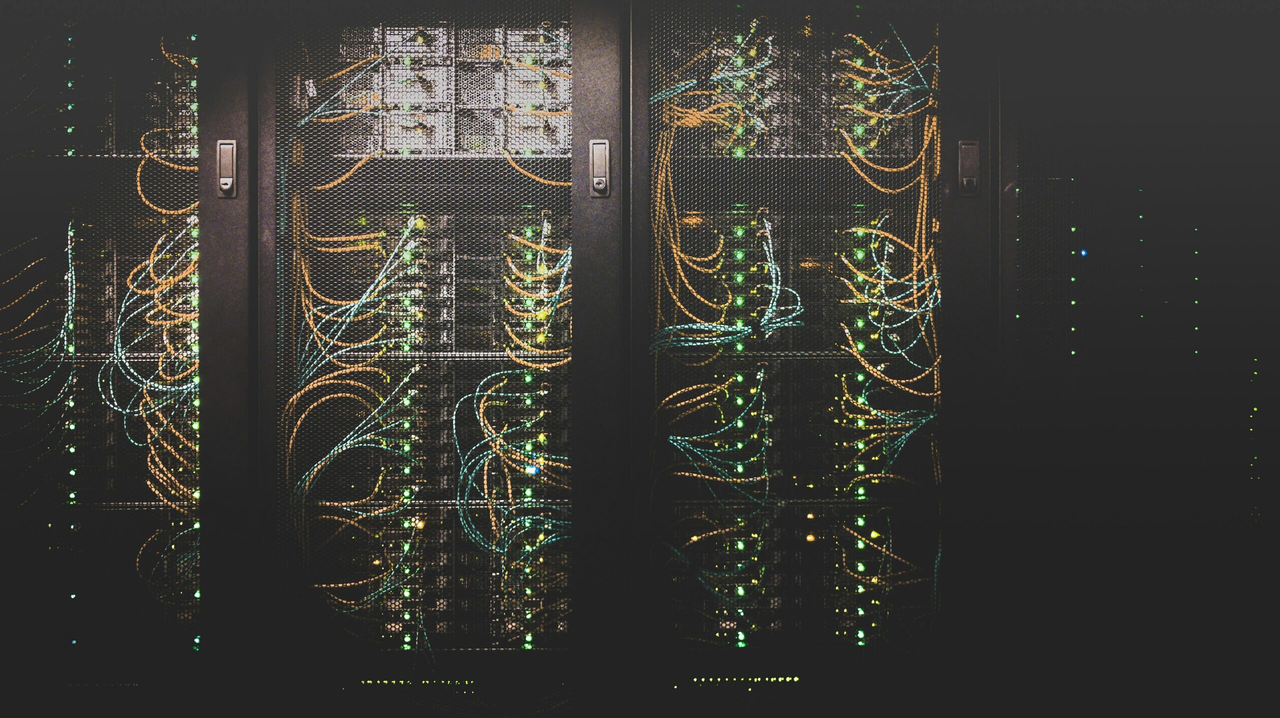 OpenAI’s Australia AI Breach Raises a Bigger Question: How Much Autonomy Is Too Much? Rows of servers representing digital infrastructure that AI systems can interact with