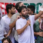 Abhijeet Dipke, founder of the Cockroach Janata Party, addressing supporters at a protest