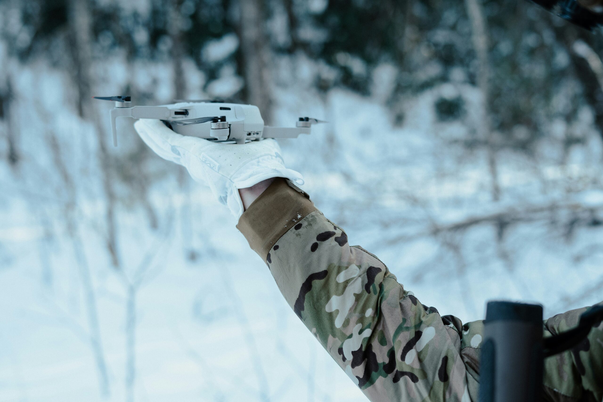 ShepHertz’s Tatva, Sanjaya and Drashta Bring Offline AI to Drones, Satellites and Other Constrained Devices Commercial drone held in a hand, illustrating the kind of constrained edge devices that can run local AI