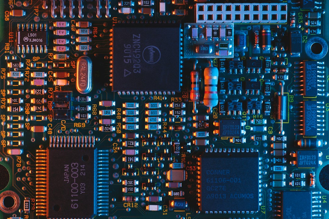 OpenAI Accuses Former Employee of Taking Unreleased Device Files to Apple Close-up of electronic circuit board hardware, representative image for the trade-secret dispute