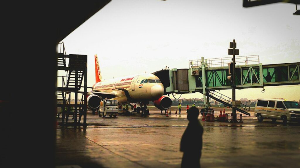 IndiGo Raises Fuel Charges From October 6 as ATF Costs Surge Passenger aircraft at an airport, representative image for IndiGo fuel charges