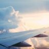 Singapore Airlines' 25.1% Air India Stake Faces a New Test as Funding Talks Intensify Commercial passenger aircraft flying above clouds, illustrating Singapore Airlines' investment in Air India's turnaround
