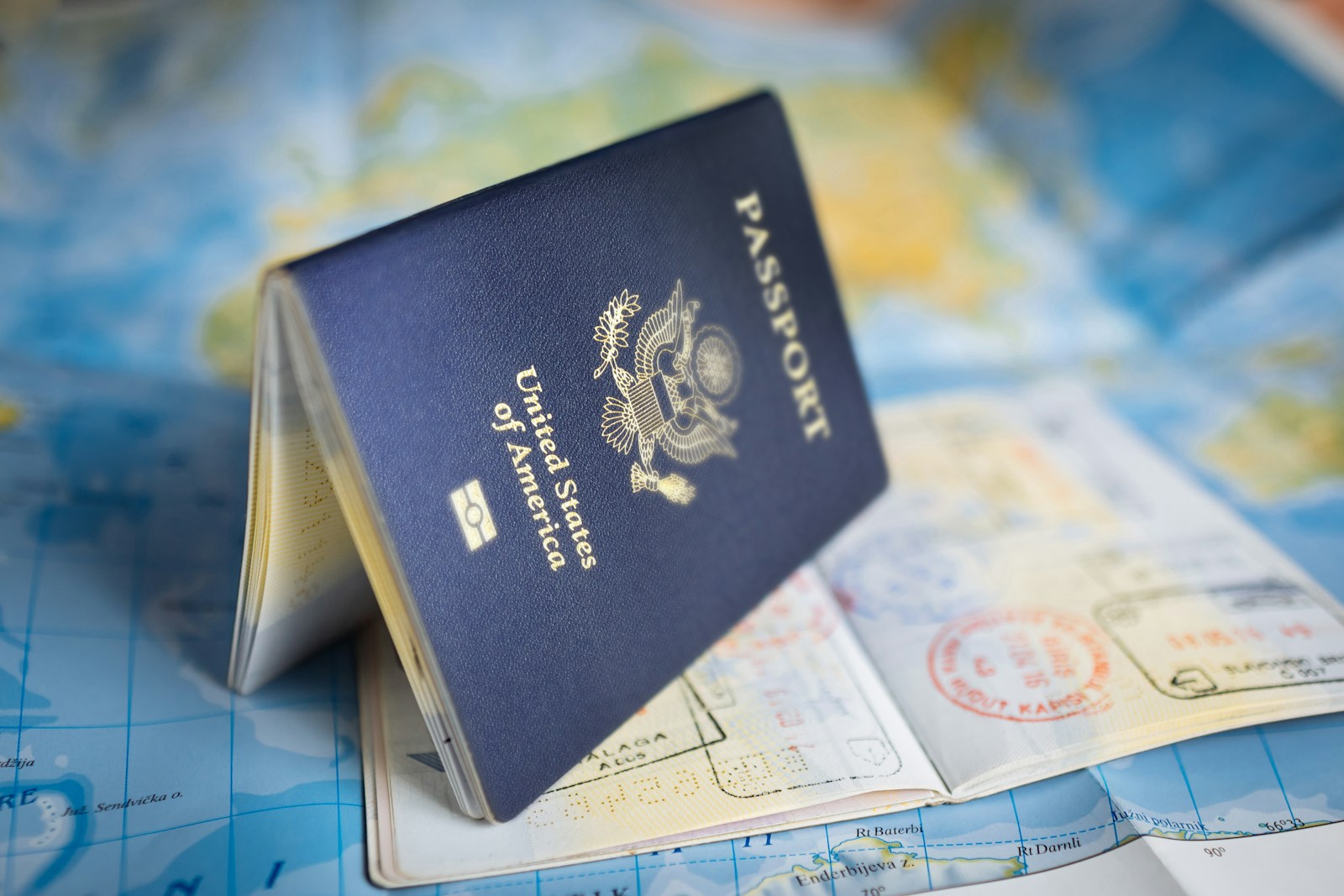 US Freezes Microsoft and Major IT Firms’ Green Card Applications Under PERM United States passport illustrating the employment based immigration and green card pathway